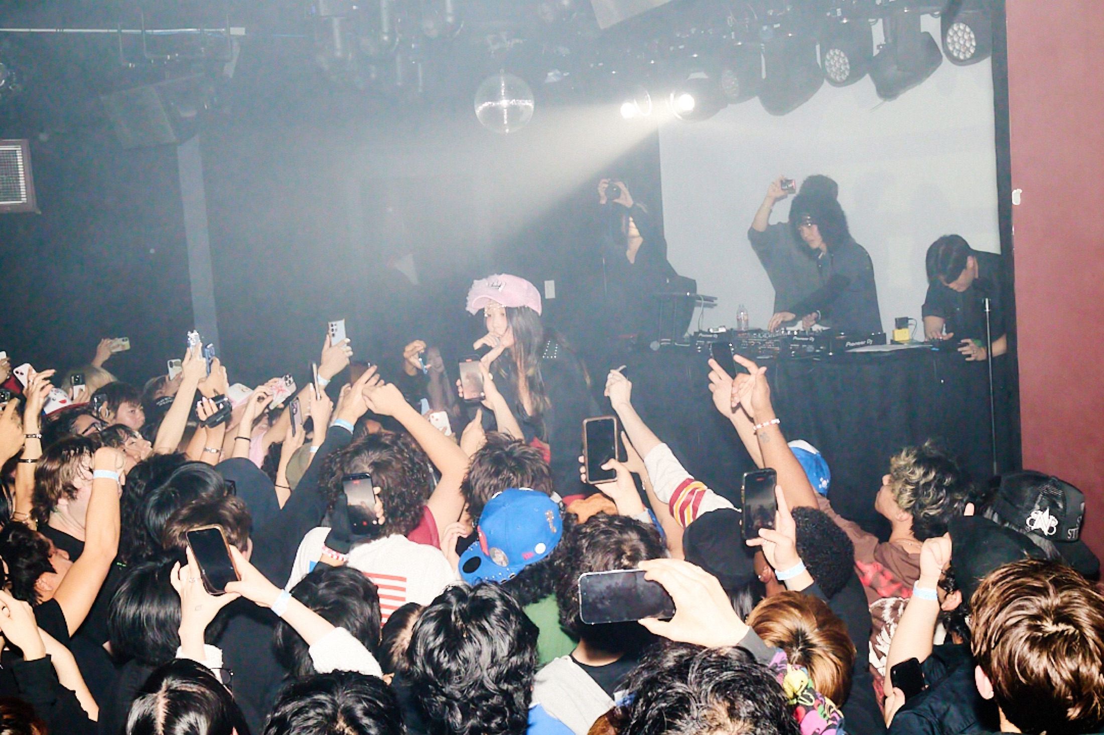 pop-up release party — phones up, room full